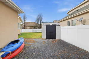 View of fenced backyard