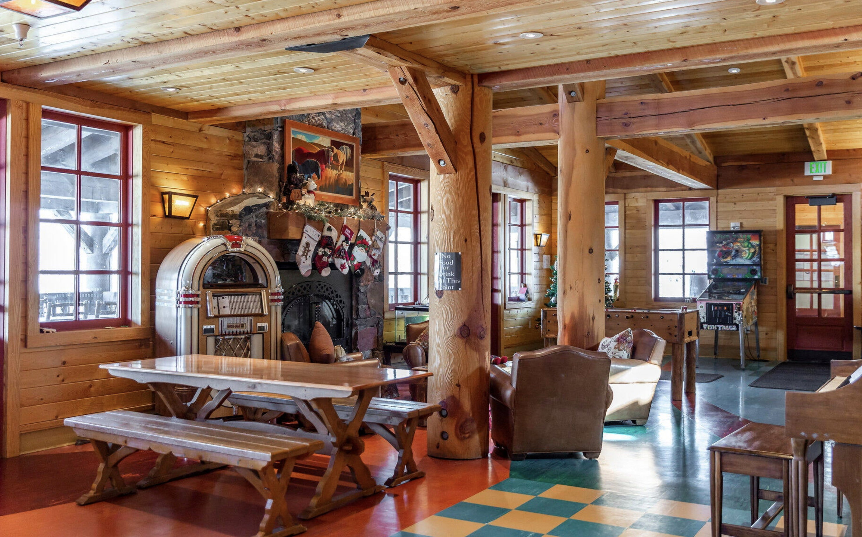 Sitting room with wood walls and wooden ceiling