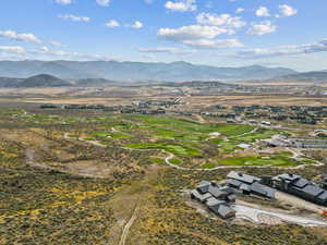 Aerial view of mountains and a golf club