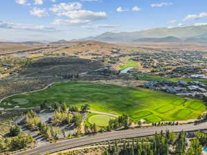 Aerial view of mountains and a local golf course