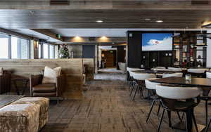 Common area featuring wooden walls