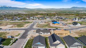 Aerial view of residential area with a mountainous background