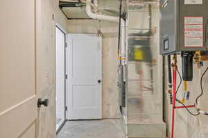 Utilities with tankless water heater and heating unit