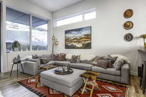 Living area featuring wood-type flooring