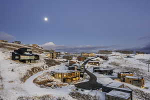 Snowy aerial view with a residential view