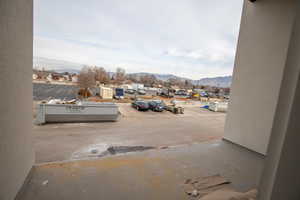 View of patio / terrace with a mountain view and a residential view