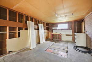 Miscellaneous room featuring concrete flooring
