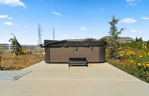 View of patio / terrace featuring a hot tub
