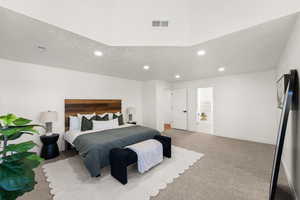 Bedroom featuring recessed lighting, light colored carpet, and a textured ceiling