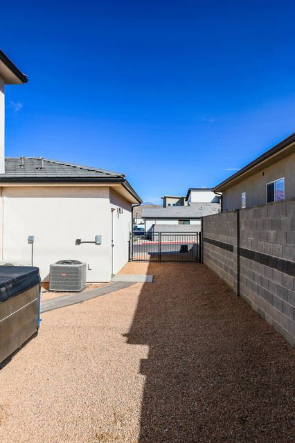 Fenced backyard with a gate