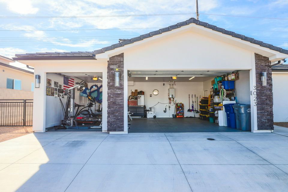 Garage with concrete driveway