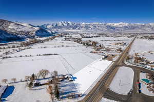 Snowy aerial view with a mountain view
