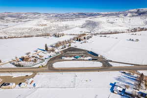 Snowy aerial view with a mountain view
