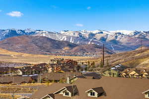 View of mountain backdrop with nearby suburban area