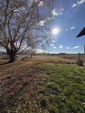 View of yard with a view of countryside