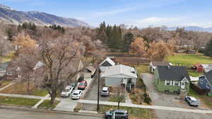 Aerial view of residential area featuring a mountain backdrop