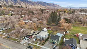 Aerial perspective of suburban area with a mountain backdrop