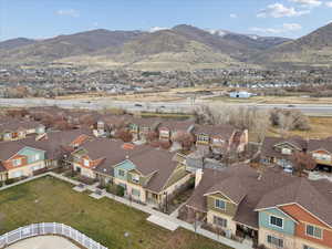 Aerial view of residential area with a mountainous background