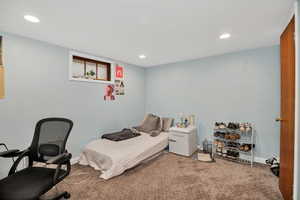 2nd Bedroom with carpet floors and recessed lighting