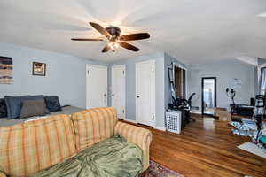 2nd Bedroom with lofted ceiling, a ceiling fan, and hardwood / wood-style flooring