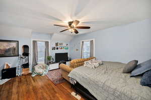 2nd Bedroom with lofted ceiling, a ceiling fan, and hardwood / wood-style flooring