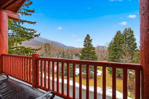 Balcony featuring a mountain view