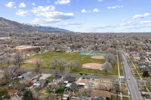 View of property location featuring nearby suburban area and mountains