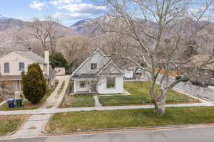 View of front of home with covered porch and a mountain view