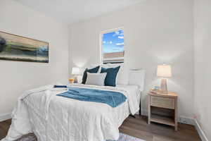 Bedroom featuring wood finished floors