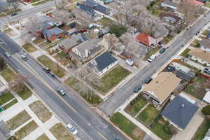 Aerial view of property's location featuring nearby suburban area
