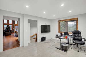 Office area featuring recessed lighting and wood finish floors