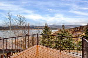 Wooden deck featuring a mountain view