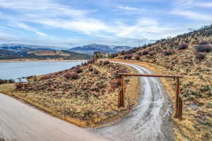 View of mountain backdrop with a large body of water