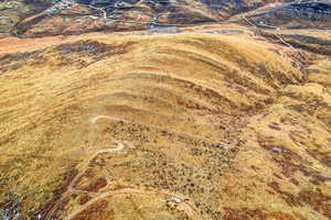 Aerial view of property and surrounding area with rural landscape