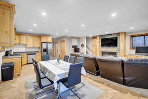Dining room featuring recessed lighting and a fireplace