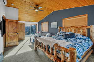 Bedroom featuring access to exterior, light carpet, wood ceiling, and a ceiling fan