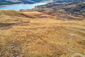 View of mountain backdrop with a nearby body of water