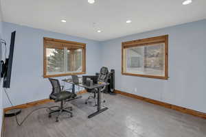 Home office with baseboards and recessed lighting