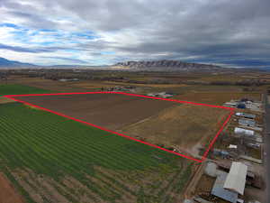 View of rural area featuring property parcel outlined and mountains