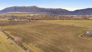 View of mountain backdrop with rural landscape