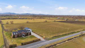 Overview of rural landscape with a mountain backdrop