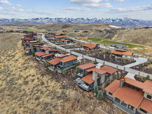 Aerial view of residential area with a mountainous background