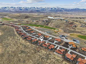 Aerial overview of property's location featuring mountains