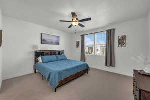 Bedroom with carpet floors and ceiling fan