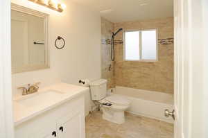 Full bath with vanity and bathing tub / shower combination
