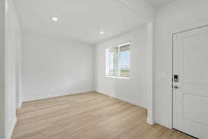 Foyer entrance featuring light wood-type flooring and recessed lighting