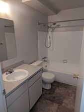 Full bath featuring vanity and shower / washtub combination
