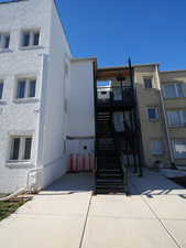 View of apartment building / complex with stairway