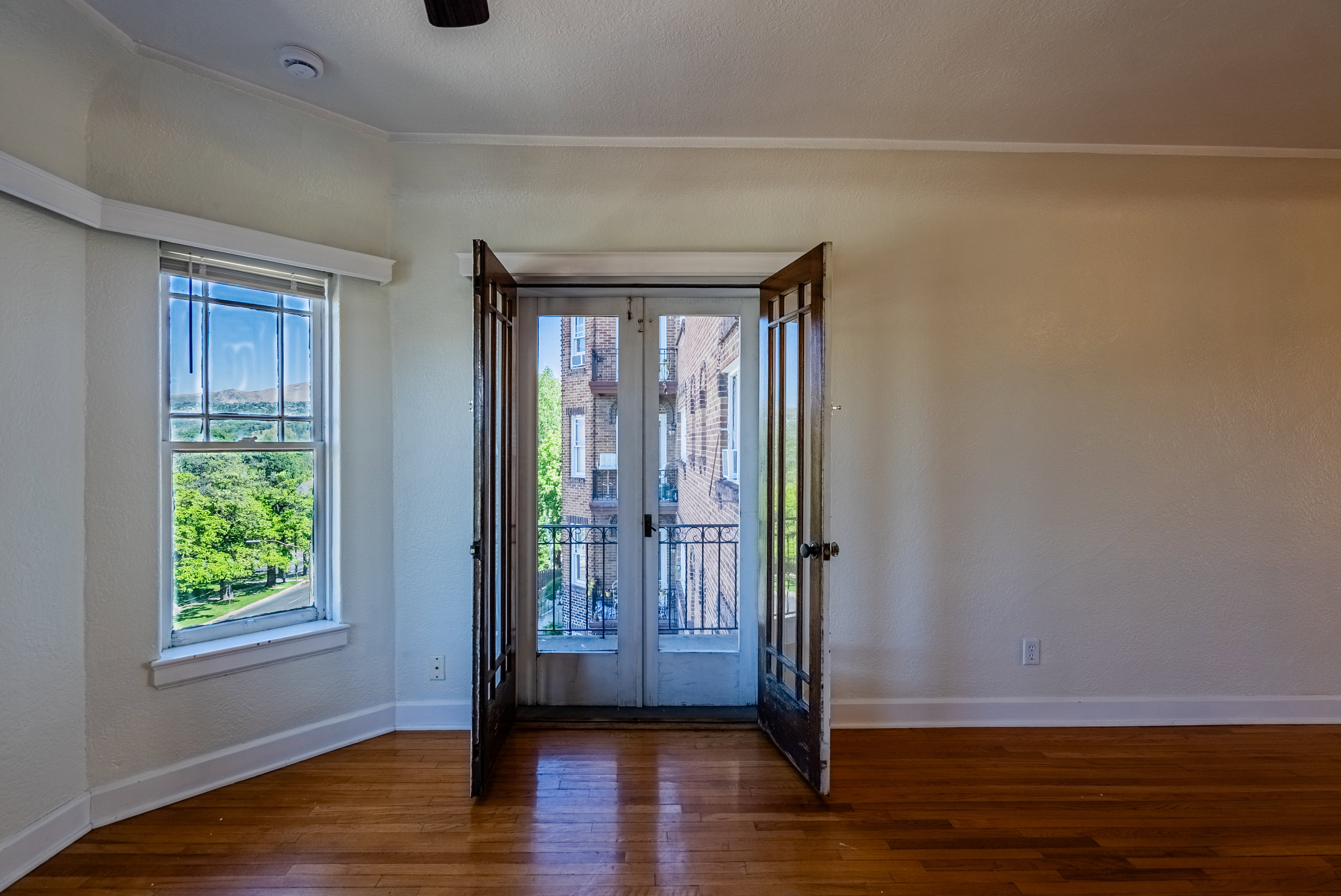 Hardwood flooring complementing light-toned walls