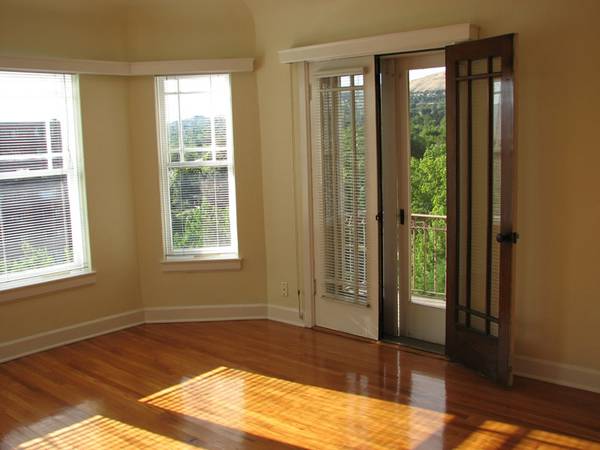 Apt # 11 > Doorway with wood finished floors